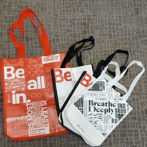 Four reusable Lululemon tote bags